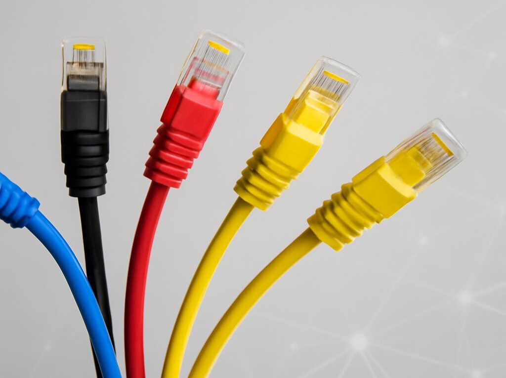 Active coax to Ethernet adapters connected to an RJ45 network cable